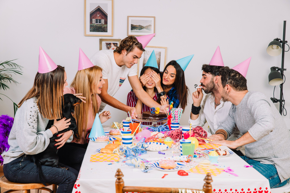 Group of friends or family celebrating a birthday together, emphasizing connection and joy.